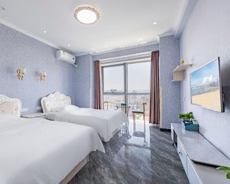 Zhiyuan Holiday Apartment - Weihai - Bedroom