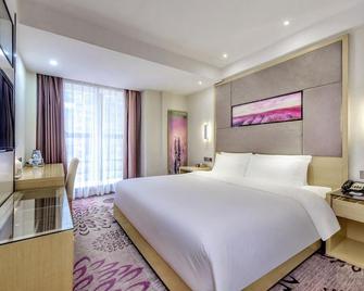Lavande Hotel Luzhou Jiale Century City - Luzhou - Bedroom