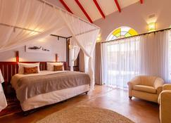 The Courtney Lodge - Victoria Falls - Bedroom