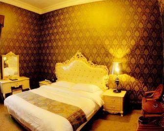 Ci'enlu Country Art Hotel - Meizhou - Bedroom