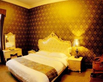 Ci'enlu Country Art Hotel - Meizhou - Bedroom