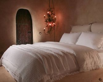 Castelul de Lut - Eco Boutique Guesthouse - Porumbacu de Sus - Habitación