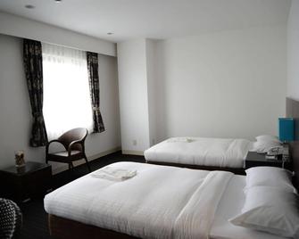Libest Inn Amami - Setouchi - Habitación