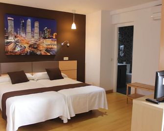 هوستال فالفيس - مدريد - غرفة نوم