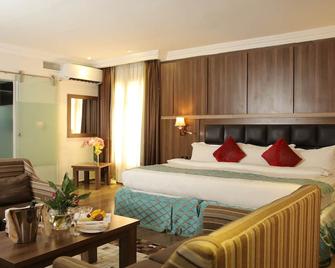 Grand Pela Hotel & Suites Abuja - Abuja - Quarto