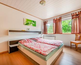 Ferienwohnungen und Ferienhaus Hafermarkt - Wildemann - Спальня