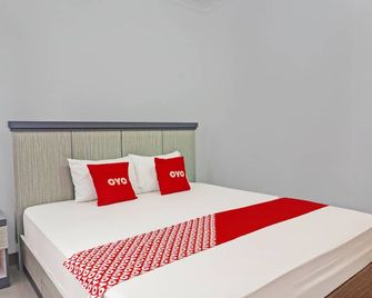 Hotel O De Luna Hotel - Banjarbaru - Schlafzimmer