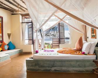Sunshine Marine Lodge - Matemwe - Bedroom