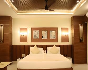 Hotel Signature - Jeypore - Bedroom