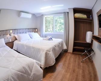 Viena Flats - Gramado - Habitación