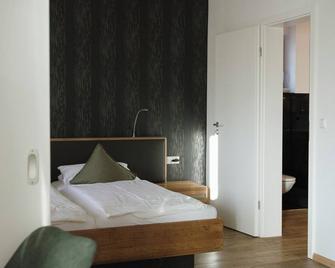 Feelfalt Café & Hotel - Bad Bellingen - Slaapkamer