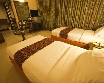 Hotel The President - Mysore - Bedroom
