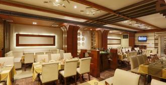 Hotel Millennium - Guwahati - Restaurante