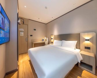 Hanting Hotel Lanzhou Radio And Television Center - Lanzhou - Bedroom