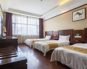 Xizhi Hotel - Linyi - Bedroom