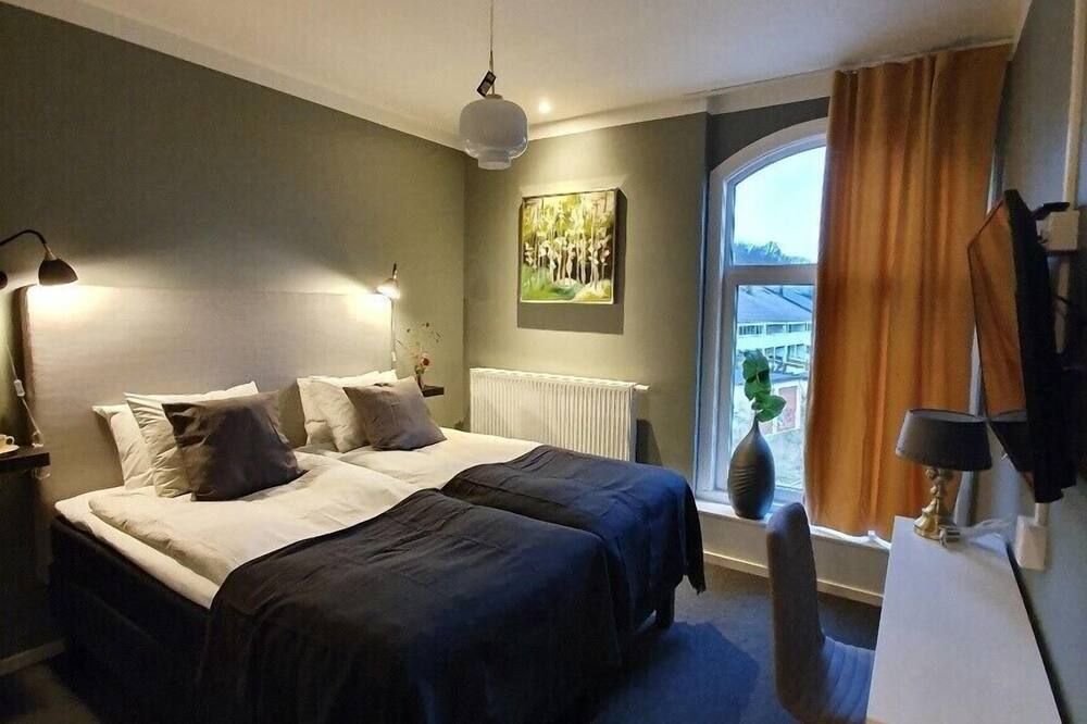 Hotell Carl Friman - Motala - Schlafzimmer
