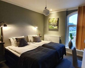 Hotell Carl Friman - Motala - Schlafzimmer