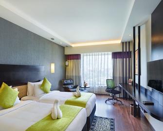 Hycinth Hotels - טריבאנדרום - חדר שינה