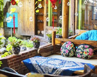 Butterfly Flowers Inn - Zhangjiajie - Patio