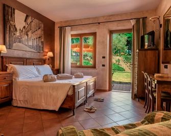 Casanova - Wellness Center La Grotta Etrusca - San Quirico d'Orcia - Bedroom