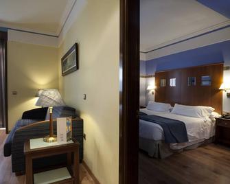 Suites Gran Vía 44 - Granada - Schlafzimmer