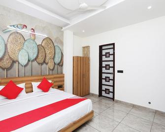 Hotel O Rama Grand - Rohtak - Bedroom
