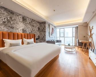 Lisidun Apartment Hotel - Chengdu - Habitación