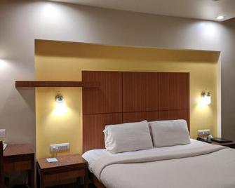 Hotel Sankam Residency - Belgaum - Bedroom