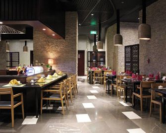 Holiday Villa Hotel And Residence City Centre Doha - דוחה - מסעדה