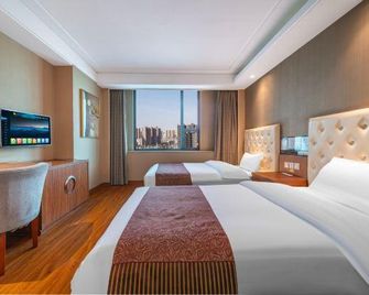 Super 8 by Wyndham Zhengzhou Railway Station Square - Zhengzhou - Habitación