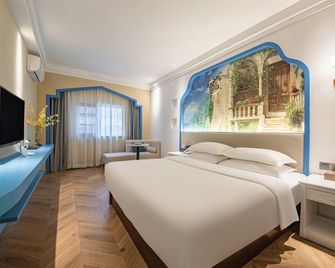 Kaidi'er Culture Theme Hotel - Qiannan - Bedroom