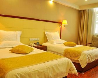 Greentree Inn Taiyuan Pingyang Road Business Hotel - Taiyuan - Slaapkamer