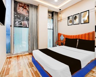 Fabhotel Royal Orbits - 蘇拉特 - 臥室
