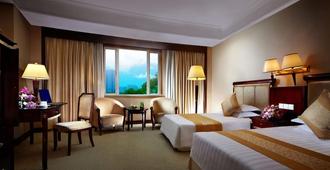 New Century Hotel Taizhou - Taizhou - Bedroom