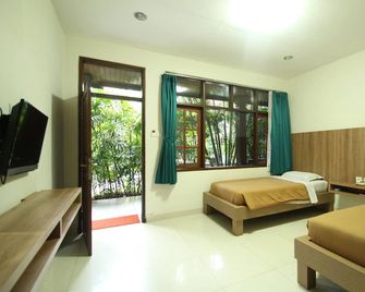 Simpang Inn Hotel - Kuta - Habitación
