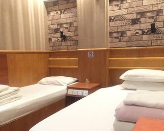 New Garden Hostel - Hong Kong - Bedroom