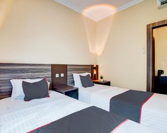Dancenter King's Homestay - Pekanbaru - Bedroom