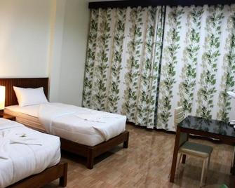The Win Hotel - บางสะพาน - ห้องนอน