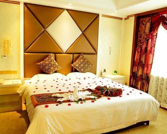 Xintiandi Hotel Qujing - Qianxinan - Bedroom