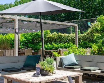 Embrace stillness in style | Rejuvenating Haven near local sights & Nature - Bosschenhoofd - Binnenhof