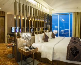 Cambridge Hotel Medan - Medan - Slaapkamer