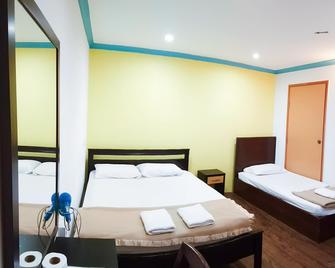 Twin Star Hotel - Tanjong Malim - Camera da letto