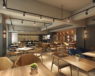 هوليداي إن إكسبرس شانغهاي باوشان باويانج باي آيتش جي - شنغهاي - مطعم