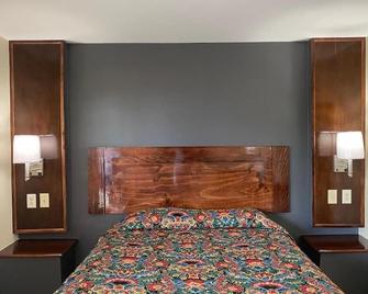 Relax Inn-Plaquemine - Plaquemine - Bedroom
