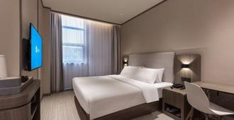 Hanting Hotel Nantong Jinfeida Plaza - نانتونغ - غرفة نوم