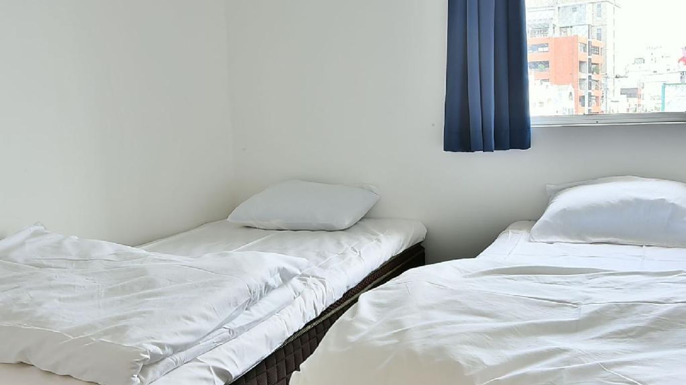 國際通美客室旅館