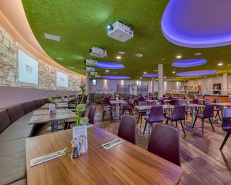 斯圖加特希爾頓酒店耐卡公園店 - 斯圖加特 - 餐廳