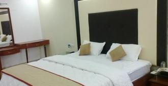 Hotel The Sutrupti - Bhubaneswar - Bedroom