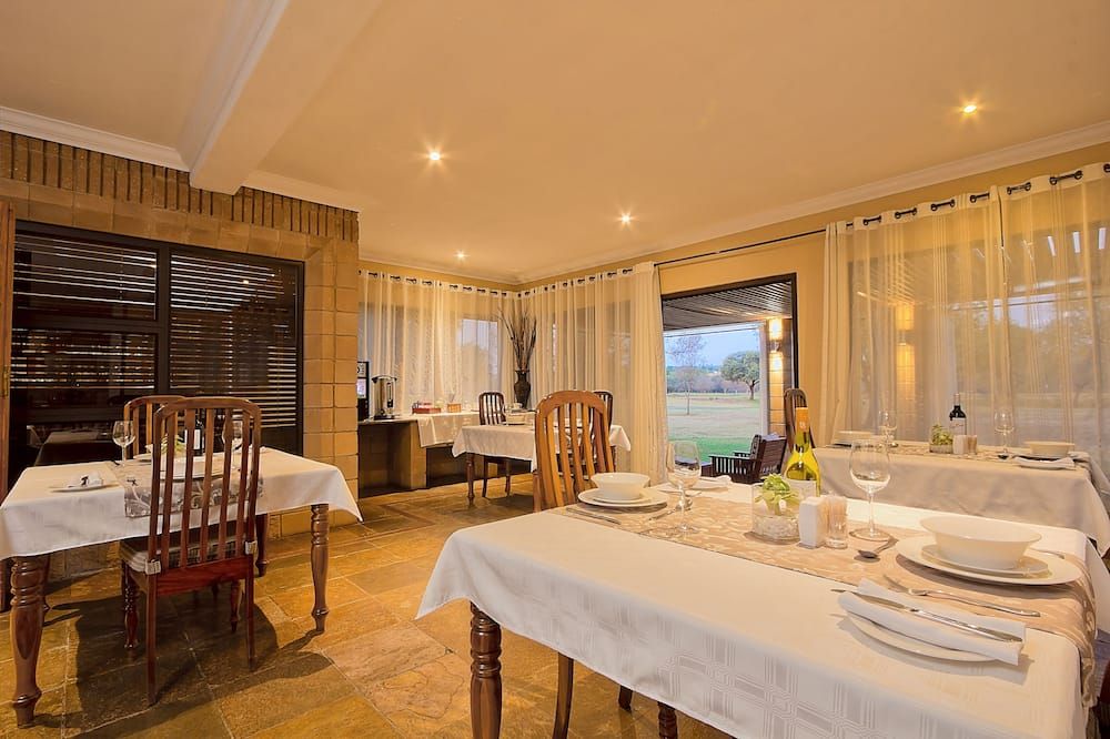 Centurion Golf Suites Boca Walk - Centurion - Salle à manger