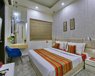 Hotel Fortune Inn- Noida Sector 19 - Нойда - Спальня